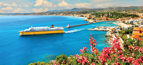 A view of a cruise ship leaving the European harbour on the Mediterranean coastline, which can be enjoyed when you book a Mediterranean cruise with Flight Centre.