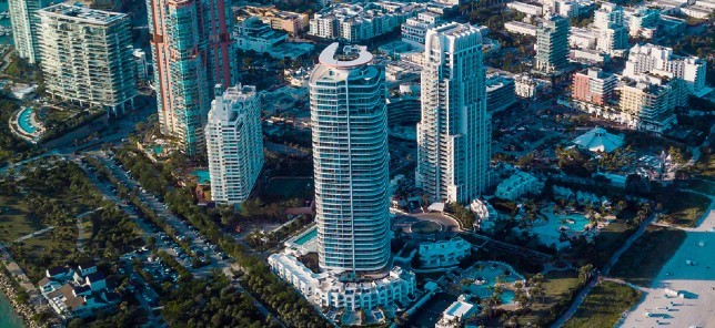 A view of modern seaside hotels that can be enjoyed when booked with Flight Centre.
