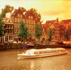 A view of a canal in Amsterdam, which can be toured via a cheap flight from Flight Centre.