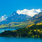 A view of New Zealand's mountainous landscape, which can be toured via a cheap flight from Flight Centre.