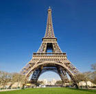 A close-up view of the Eiffel Tower in Paris, which can be visited via a cheap flight from Flight Centre.