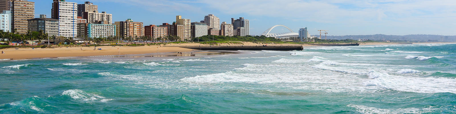 A view of Durban's Golden Mile coastline, which can be visited with a cheap Durban holiday package from Flight Centre.