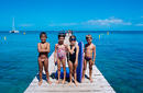 Children gather at the jetty for a swim
