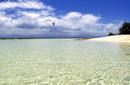 Parasailing Above The Clear Waters