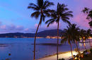 The sun sets over Patong Beach